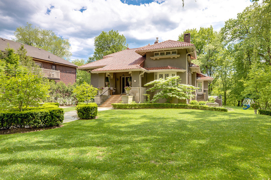 The Spanish-style chalet-style home features one-of-a-kind bungalow living in Rosedale.