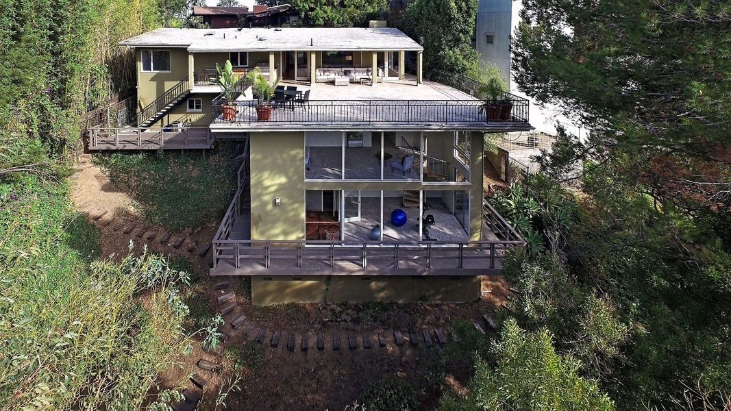 The 1,000-square-foot deck int his four-bedroom offers sweeping views of Griffith Park.